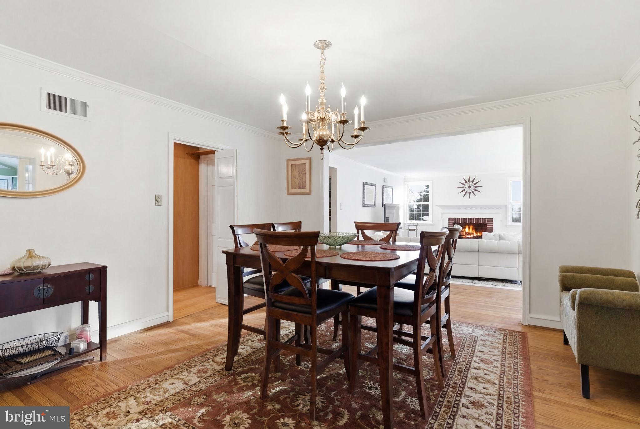 416 Rices Mill Road Wyncote, PA 19095 - Photo 15 of 60 a view of a dining room with furniture and chandelier