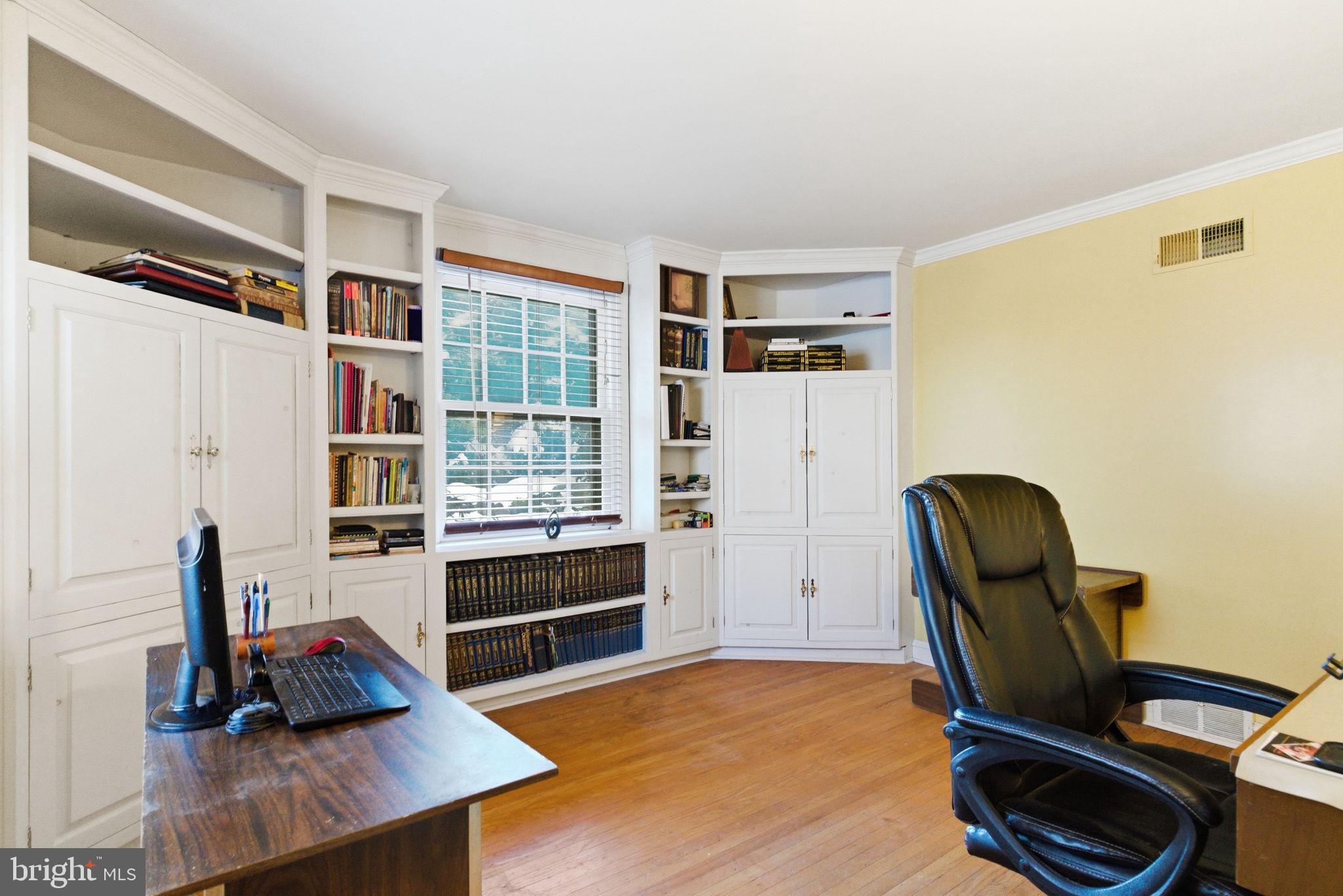 416 Rices Mill Road Wyncote, PA 19095 - Photo 21 of 60 a view of workspace with wooden floor and furniture