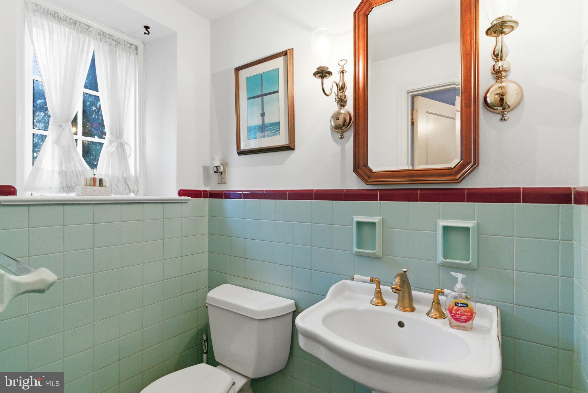 416 Rices Mill Road Wyncote, PA 19095 - Photo 22 of 60 a bathroom with a toilet sink and mirror