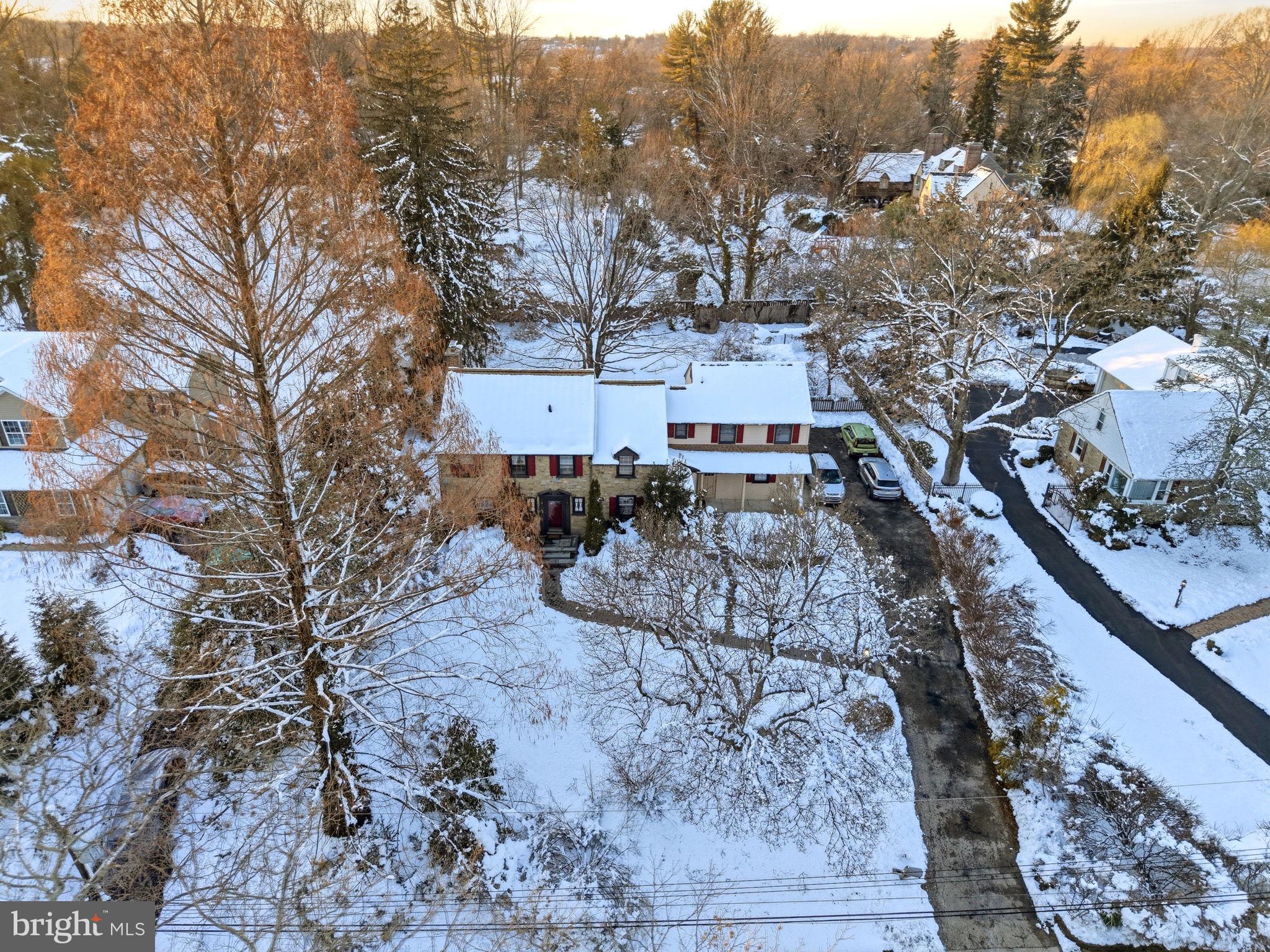416 Rices Mill Road Wyncote, PA 19095 - Photo 3 of 60 a view of a city with lush green forest