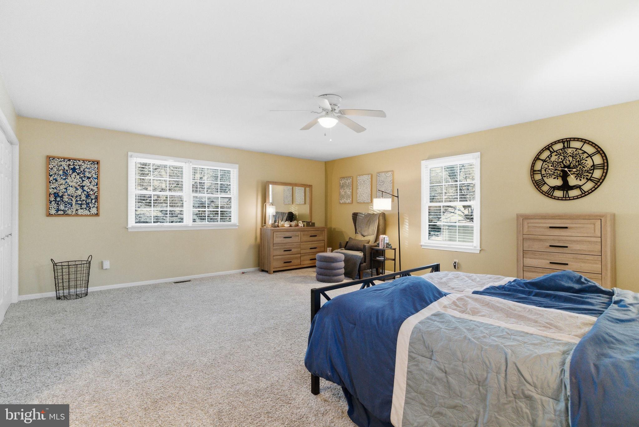 416 Rices Mill Road Wyncote, PA 19095 - Photo 32 of 60 a bedroom with a bed a dresser and next to a window