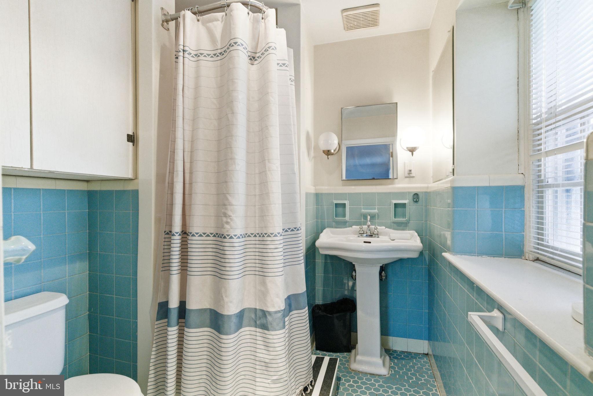 416 Rices Mill Road Wyncote, PA 19095 - Photo 37 of 60 a bathroom with a sink toilet and shower