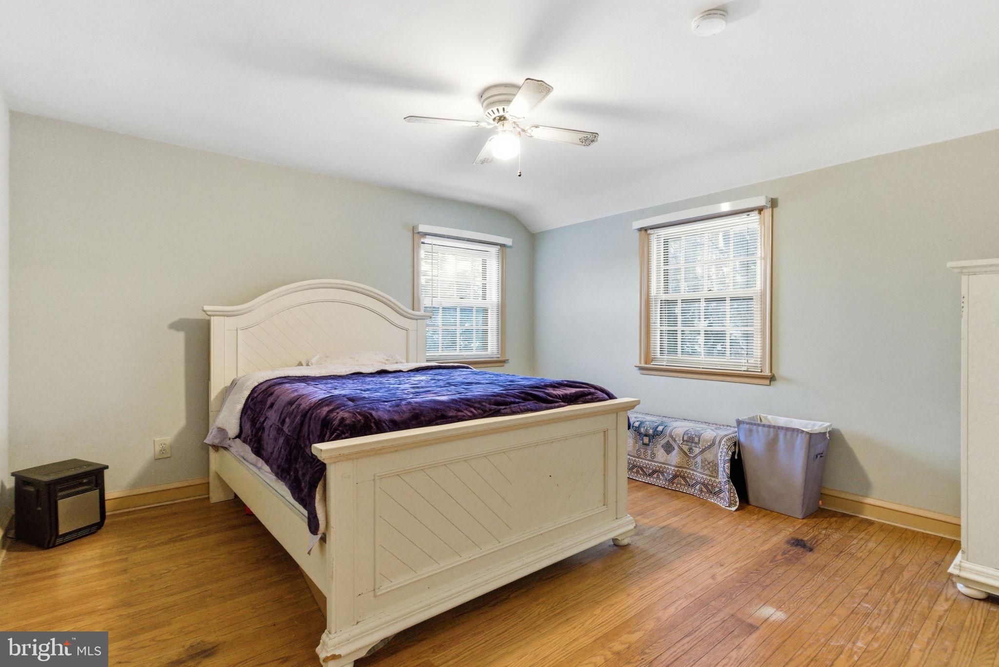 416 Rices Mill Road Wyncote, PA 19095 - Photo 38 of 60 a bedroom with bed and window