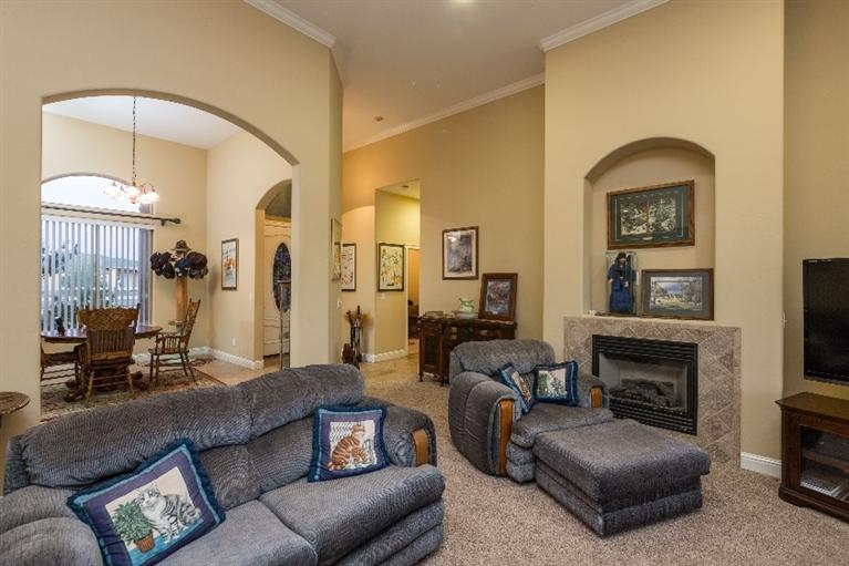 21088 Del Monte Road Madera, CA 93638 - Photo 5 of 10 a living room with furniture and a fireplace