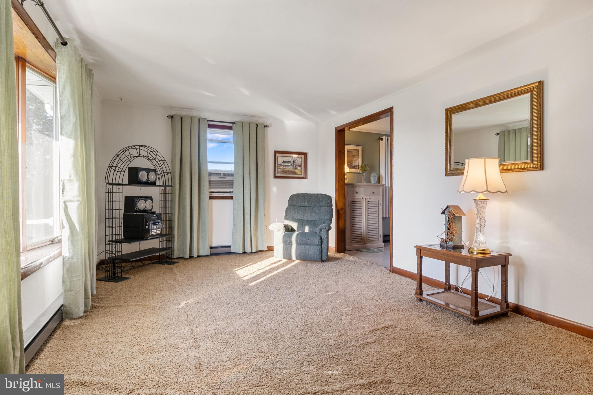397 Sechrist Flat Road Felton, PA 17322 - Photo 5 of 44 a living room with furniture and closet