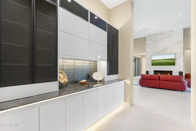 a patio with a table and chairs