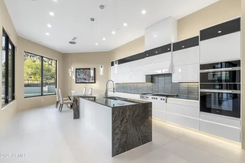 a bed room with a bed and a tv