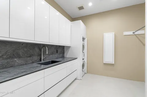 a view of swimming pool with outdoor seating