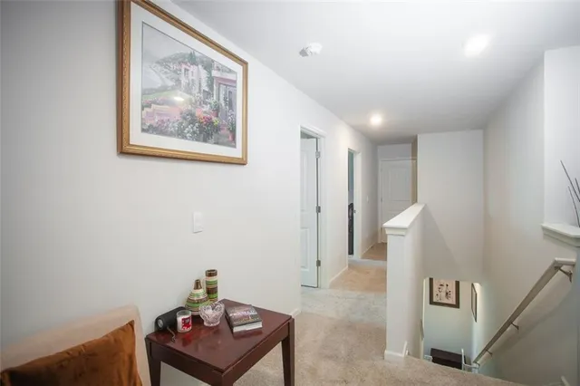 a view of a livingroom with furniture and a chandelier