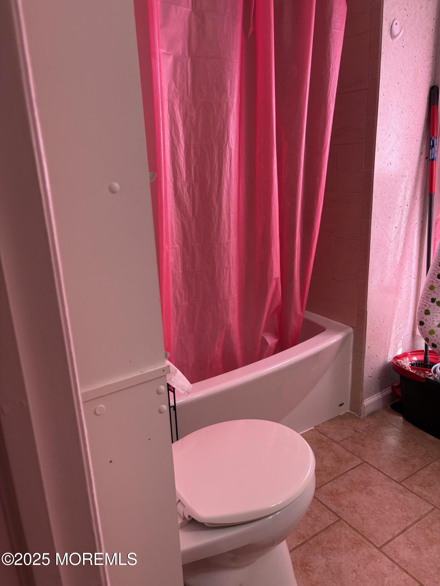 80 Jackson Street Freehold, NJ 07728 - Photo 15 of 21 a bathroom with a toilet and a bathtub