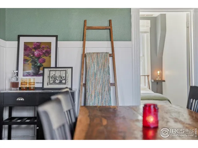 a kitchen with kitchen island a stove and a refrigerator
