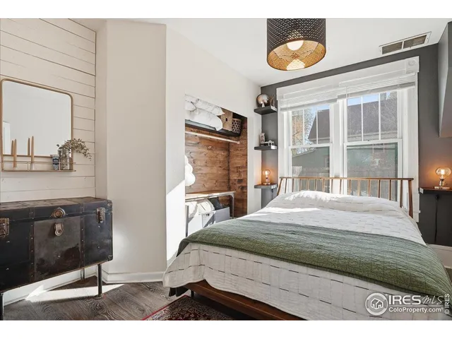 a view of kitchen with furniture and wooden floor