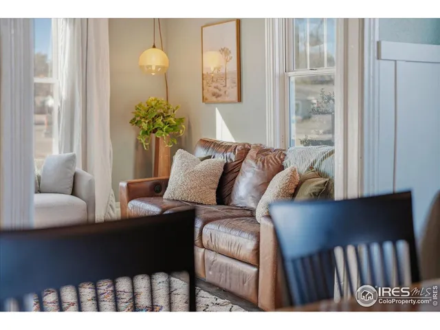 a view of a chair and table in a kitchen