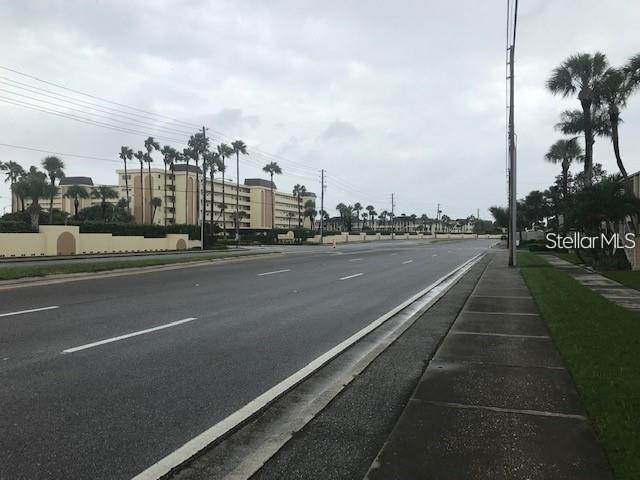 4565 Duhme Road, Unit 110 St. Petersburg, FL 33708 - Photo 12 of 13 a view of a city street both side of a street
