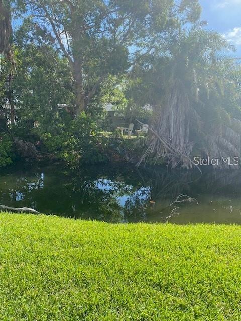 4565 Duhme Road, Unit 110 St. Petersburg, FL 33708 - Photo 9 of 13 a view of a yard