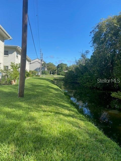 4565 Duhme Road, Unit 110 St. Petersburg, FL 33708 - Photo 10 of 13 a view of a field with a tree in it