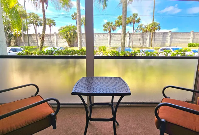 a view of a chairs in a balcony