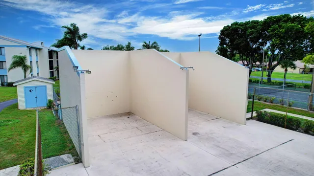 an aerial view of a house with a lake view