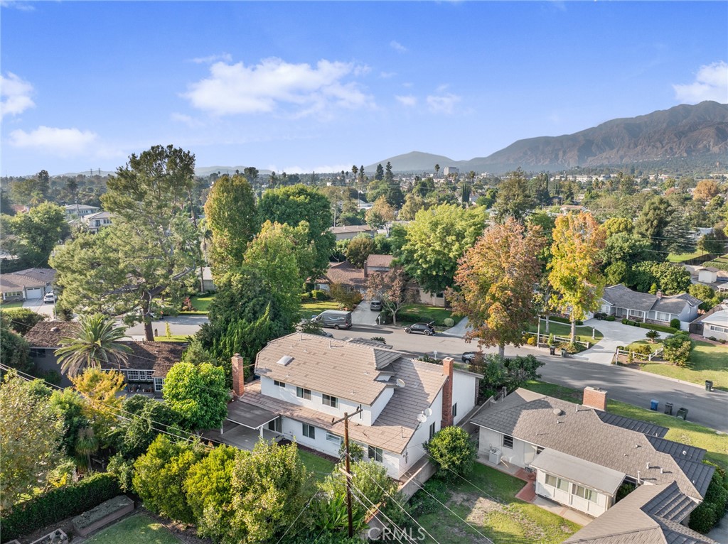1136 Columbia Road Arcadia, CA 91007 - Photo 13 of 50 an aerial view of a city with lots of residential buildings ocean and mountain view in back