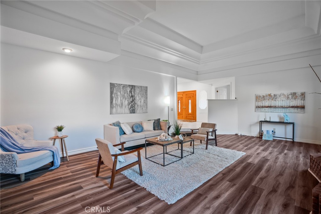 1136 Columbia Road Arcadia, CA 91007 - Photo 22 of 50 a living room with furniture and a wooden floor