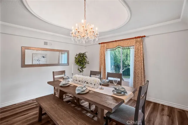a large white kitchen with a large window