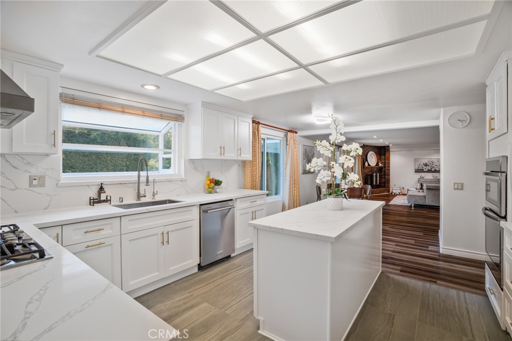 1136 Columbia Road Arcadia, CA 91007 - Photo 25 of 50 a large white kitchen with a large window