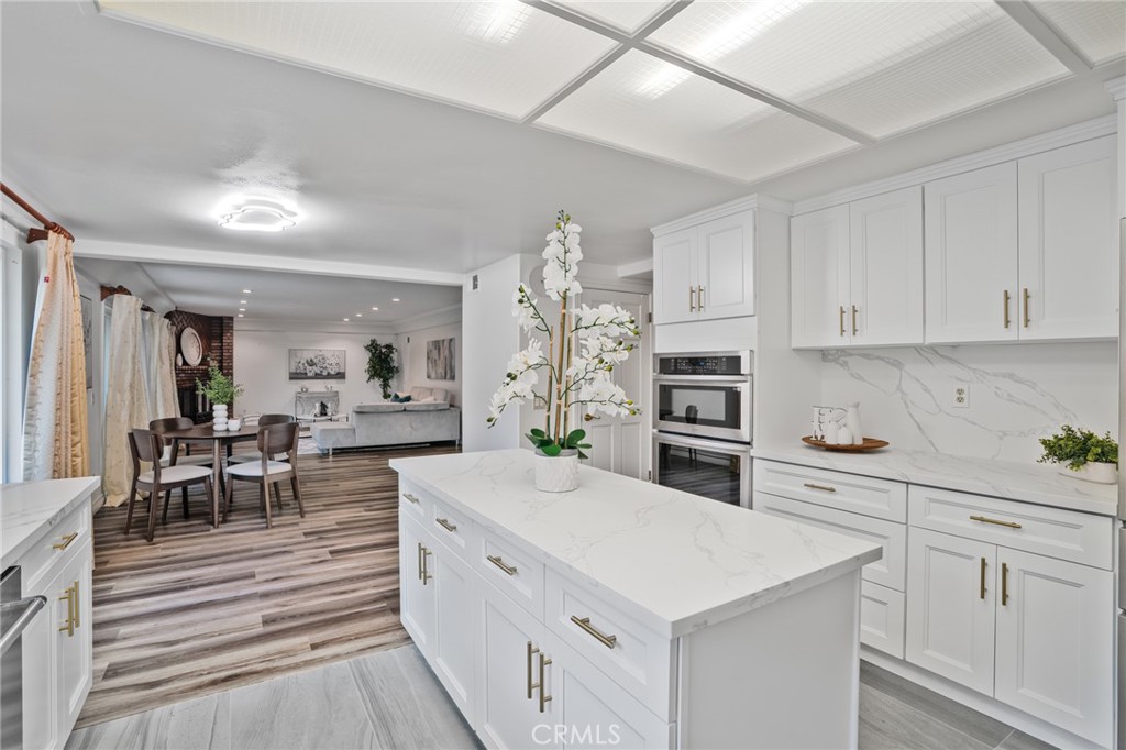 1136 Columbia Road Arcadia, CA 91007 - Photo 31 of 50 a kitchen with white cabinets and appliances