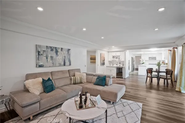 a bathroom with a double sink toilet and shower