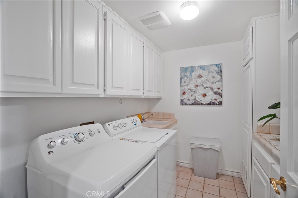 1136 Columbia Road Arcadia, CA 91007 - Photo 38 of 50 a utility room with dryer and washer