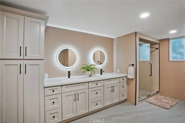 a spacious bedroom with a bed and glass window