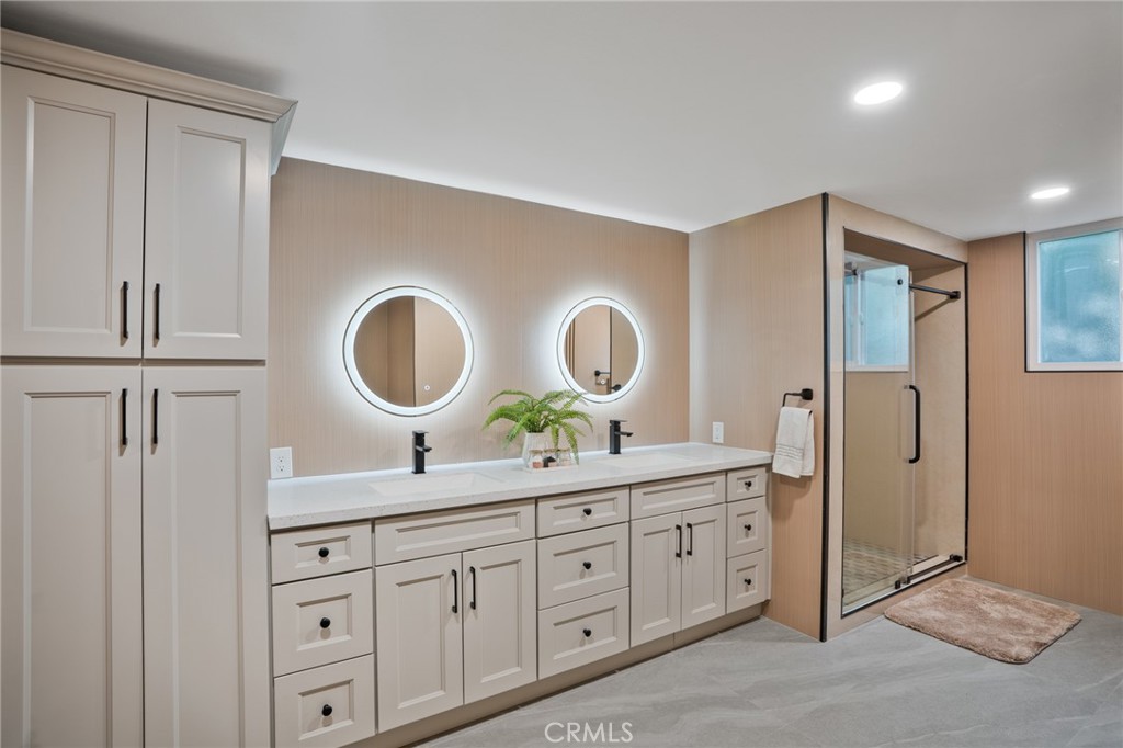 1136 Columbia Road Arcadia, CA 91007 - Photo 41 of 50 a spacious bathroom with double vanity and a mirror