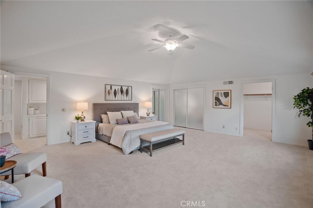 1136 Columbia Road Arcadia, CA 91007 - Photo 43 of 50 a spacious bedroom with a bed and a chandelier