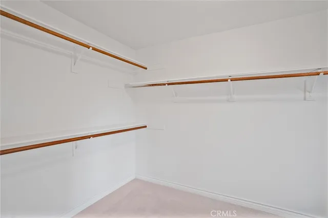 a en suite bathroom with double sink and a mirror