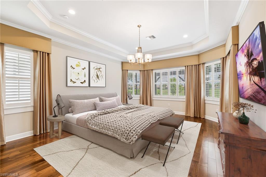 12449 Lockford Lane Naples, FL 34120 - Photo 14 of 45 a bedroom with a bed couch and a window