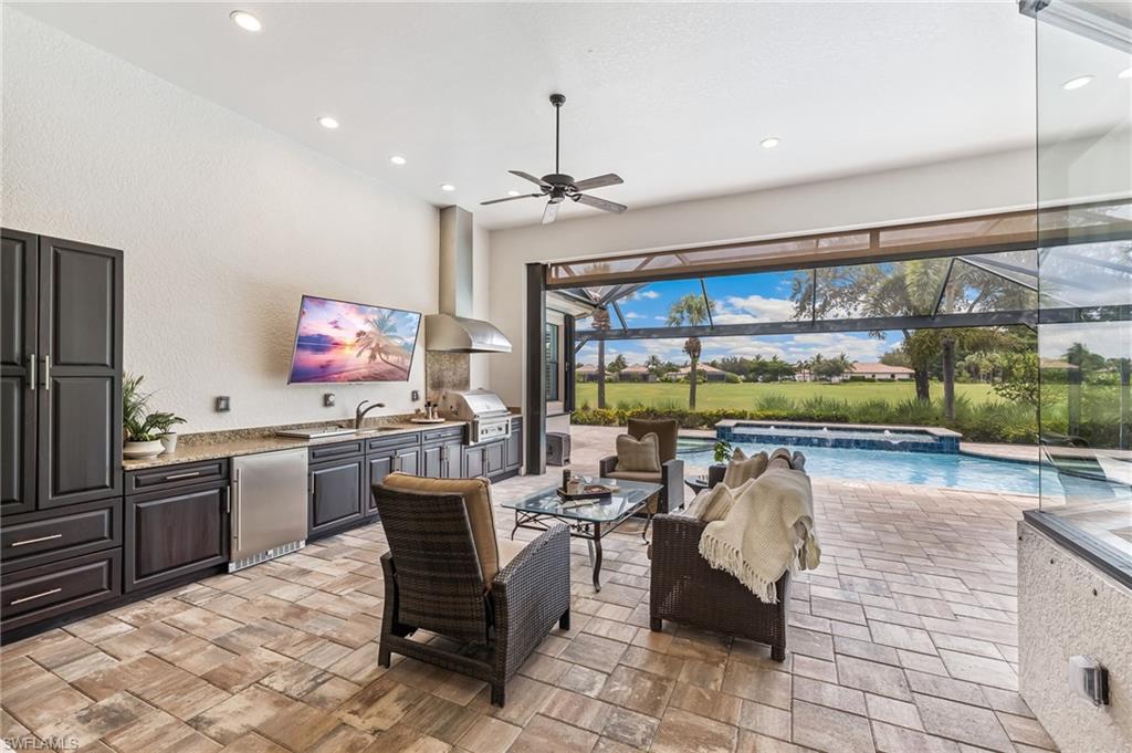 12449 Lockford Lane Naples, FL 34120 - Photo 26 of 45 a very nice looking kitchen with a large window