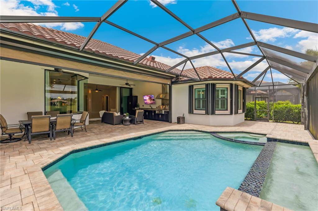 12449 Lockford Lane Naples, FL 34120 - Photo 27 of 45 a view of outdoor space yard deck and dining room