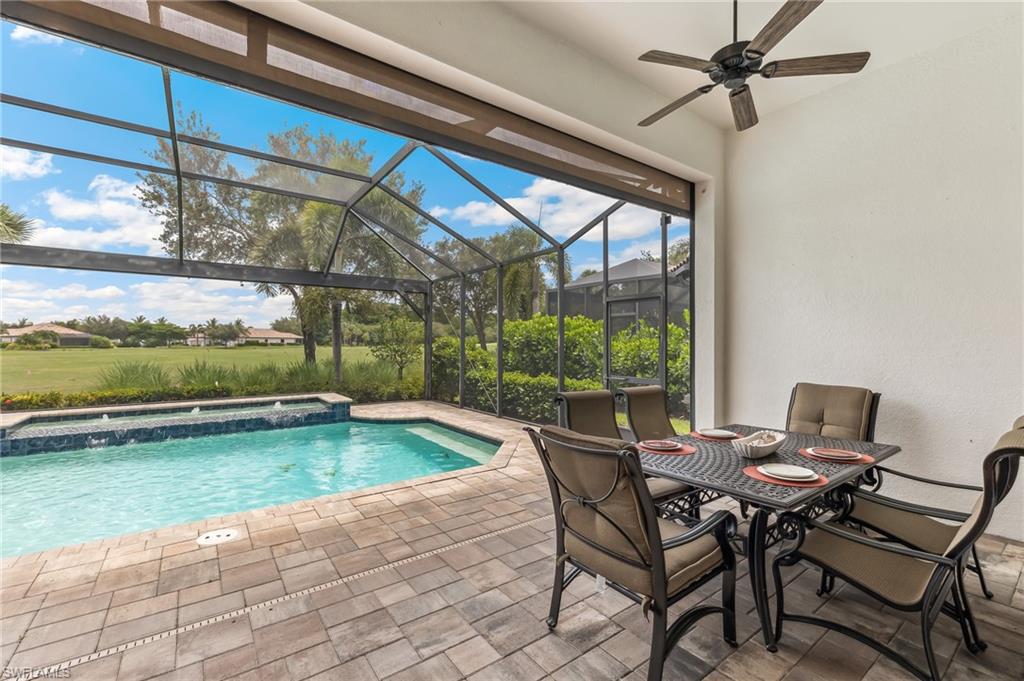 12449 Lockford Lane Naples, FL 34120 - Photo 28 of 45 a view of a dining room with furniture window and outside view