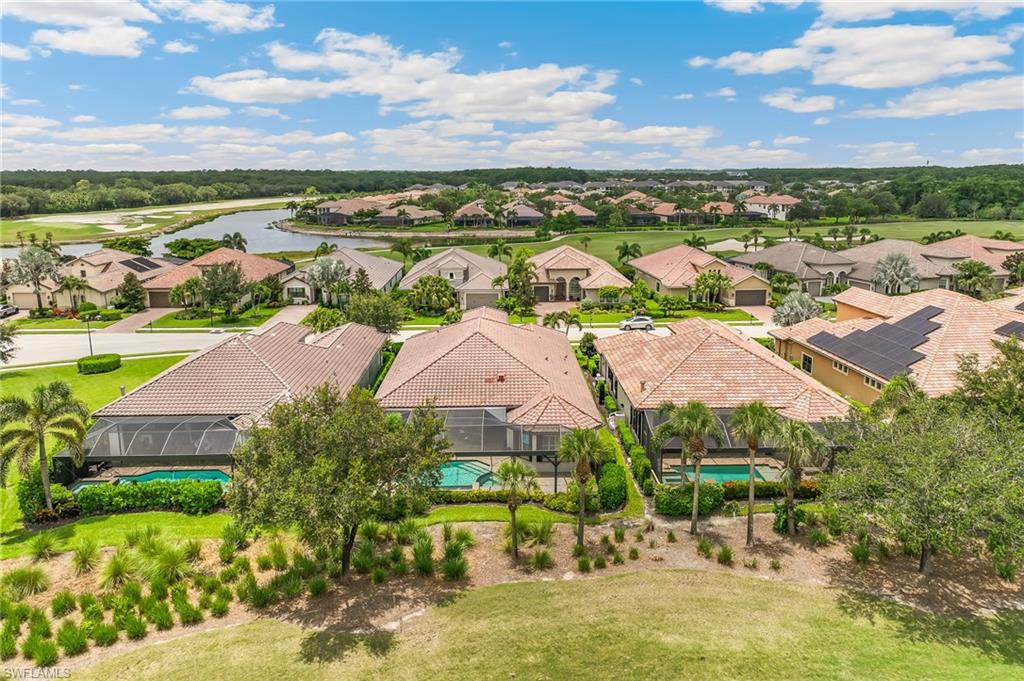 12449 Lockford Lane Naples, FL 34120 - Photo 31 of 45 an aerial view of residential house with outdoor space