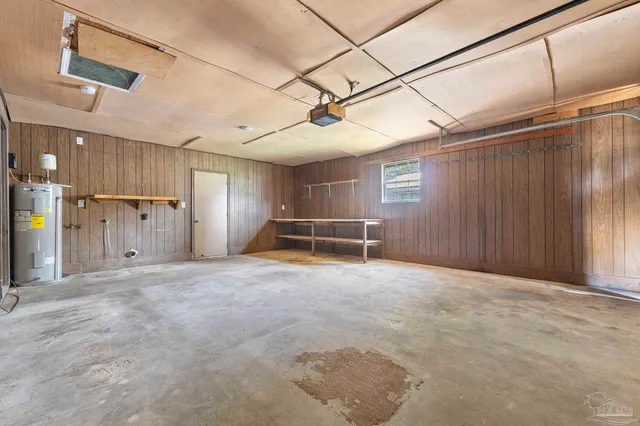 an aerial view of a house with garden space and street view