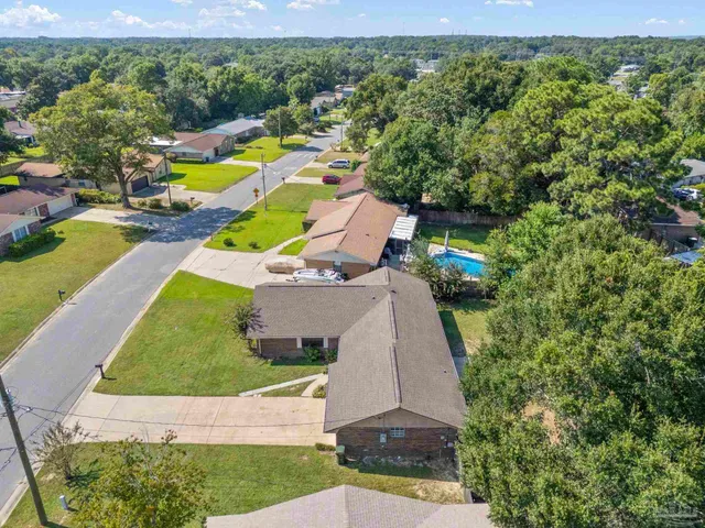 a view of a park with swings and slides