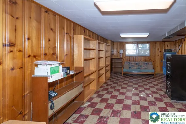 a room with window and stairs