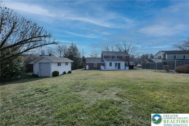 a house view with a garden space