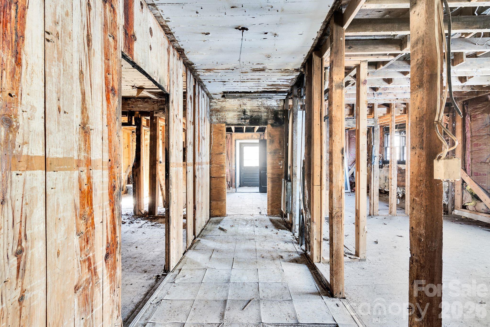 4521 Edgeland Road Edgemoor, SC 29712 - Photo 11 of 48 a view of a hallway with a door and stairs