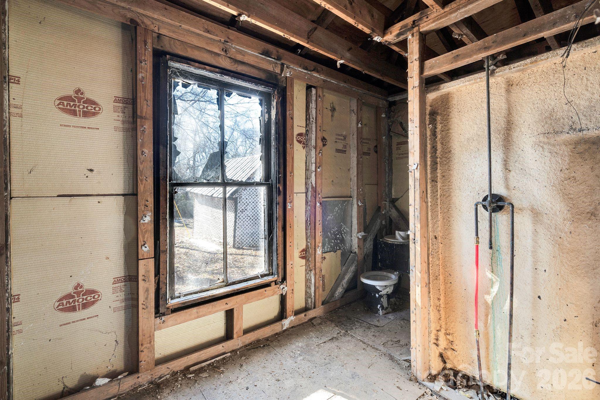 4521 Edgeland Road Edgemoor, SC 29712 - Photo 18 of 48 a bathroom with a glass shower door