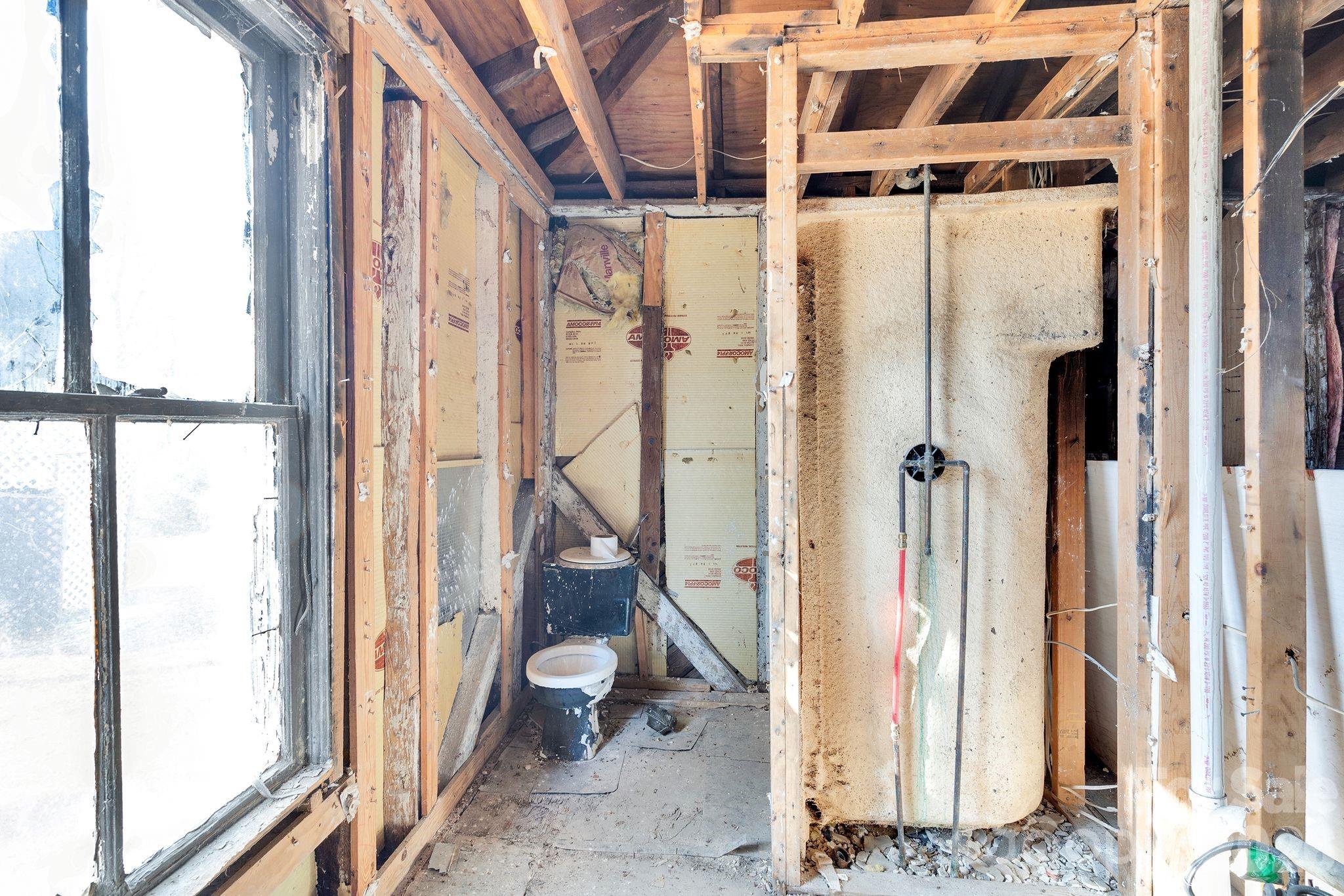 4521 Edgeland Road Edgemoor, SC 29712 - Photo 19 of 48 a bathroom with a glass shower door