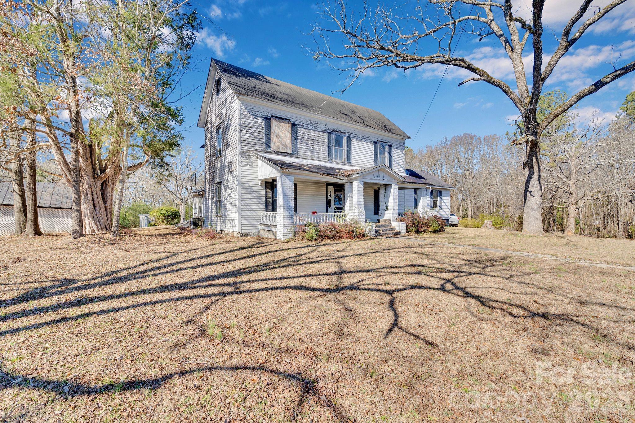 4521 Edgeland Road Edgemoor, SC 29712 - Photo 2 of 48 a view of a building with a snow on a road