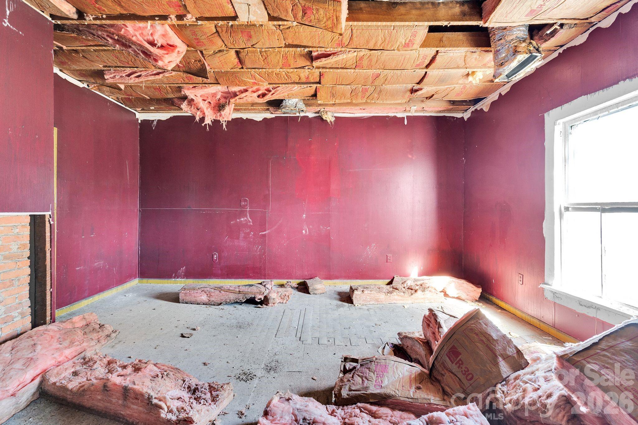 4521 Edgeland Road Edgemoor, SC 29712 - Photo 26 of 48 a bed sitting in a bedroom next to a window