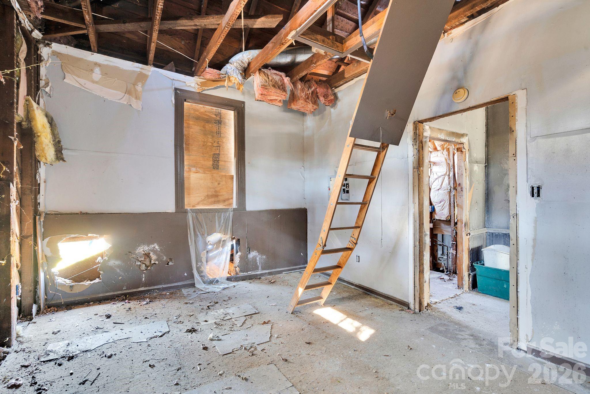 4521 Edgeland Road Edgemoor, SC 29712 - Photo 36 of 48 a view of a livingroom with wooden floor and a fireplace