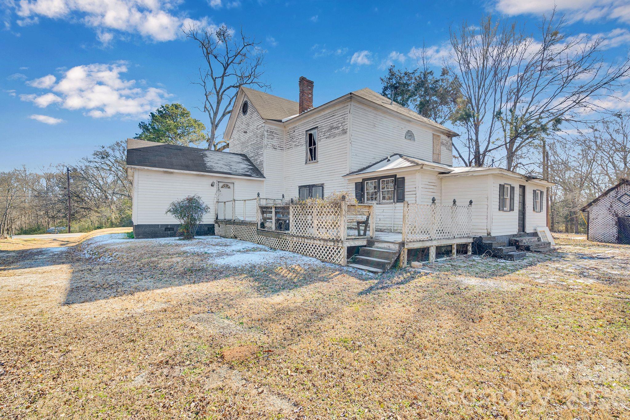 4521 Edgeland Road Edgemoor, SC 29712 - Photo 40 of 48 a view of a house with a yard covered with snow