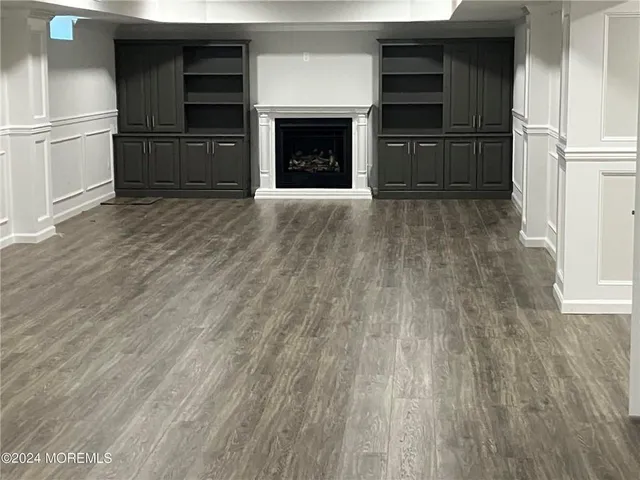 a view of kitchen with cabinets and stainless steel appliances